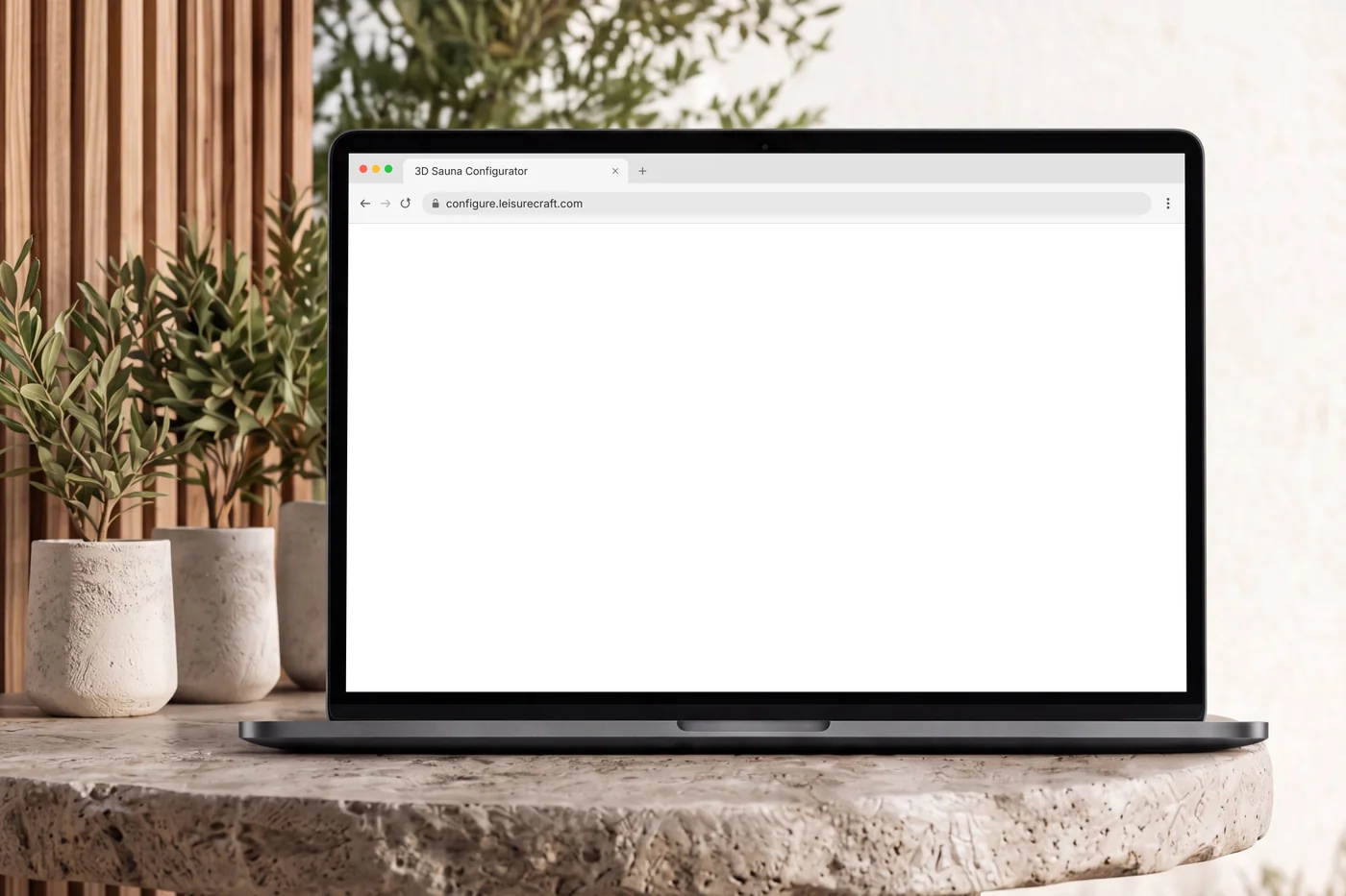 Laptop on a stone table showing the LeisureCraft 3D sauna configurator